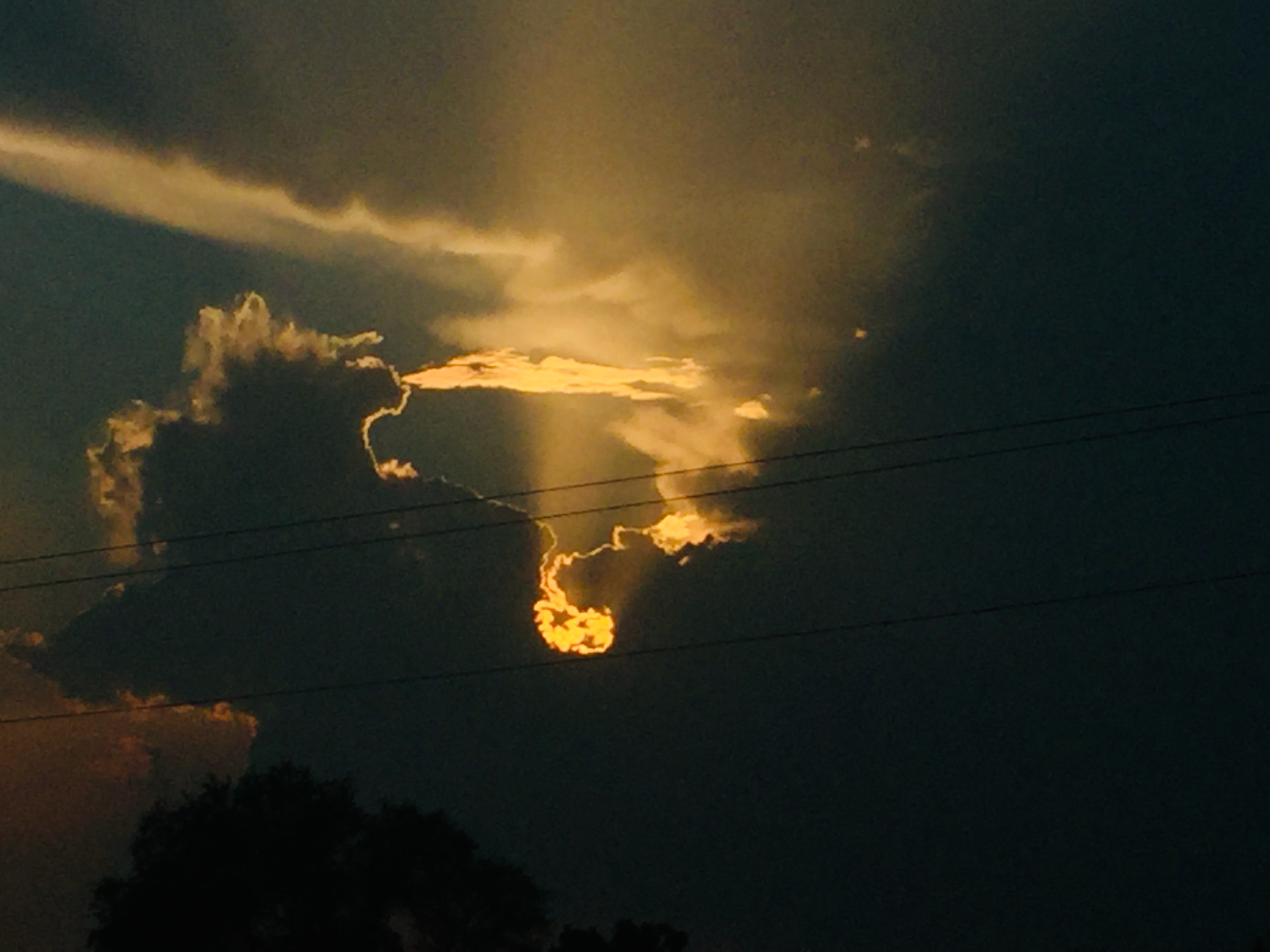 Even the darkest clouds can't stop the light from finding its way. 🌤️✨